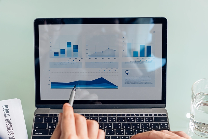 Laptop displaying sales analytics and data visualization charts — digital marketing insights and performance tracking.
